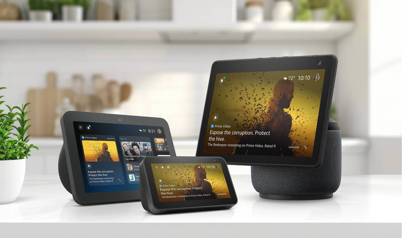 Echo Show devices in a kitchen showing a full-screen sponsored Prime Video experience with a logo, headline, and image