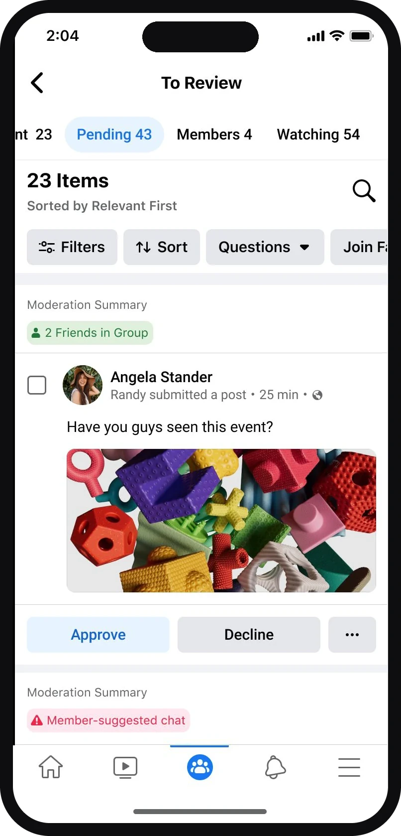 A mobile moderation queue for a group admin, with separate queues for reported content and comments and a running count of items still to review